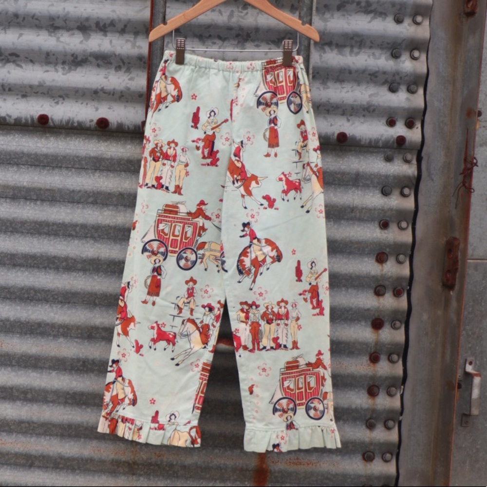 “…blessed be the name…”  Blue and Brown Cowgirl Pants